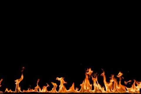 Fire flames on black background. Stock Photos