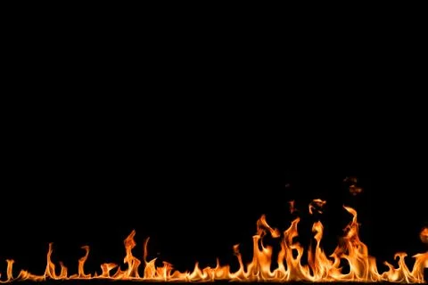 Fire flames on black background. Stock Photos