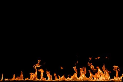 Fire flames on black background. Stock Photos
