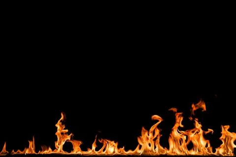 Fire flames on black background. Stock Photos
