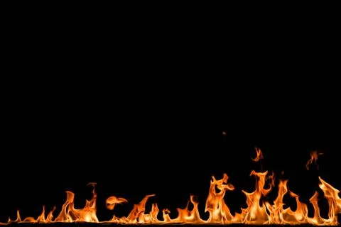 Fire flames on black background. Stock Photos