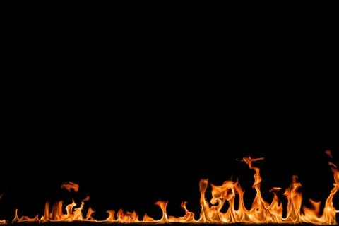 Fire flames on black background. Stock Photos
