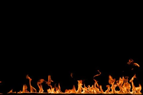 Fire flames on black background. Stock Photos