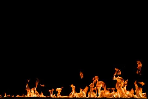 Fire flames on black background. Stock Photos