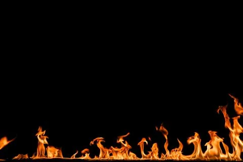 Fire flames on black background. Stock Photos