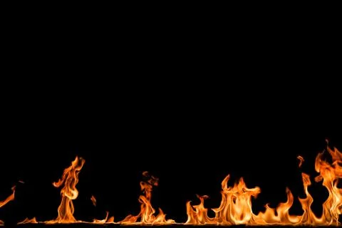 Fire flames on black background. Stock Photos