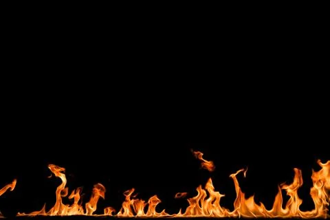Fire flames on black background. Stock Photos
