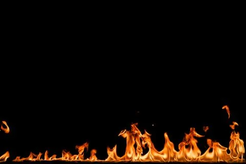 Fire flames on black background. Stock Photos