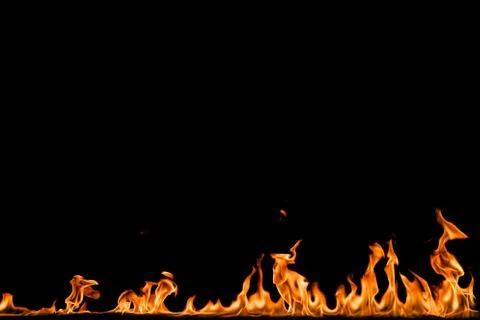 Fire flames on black background. Stock Photos
