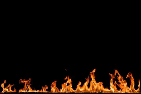 Fire flames on black background. Stock Photos