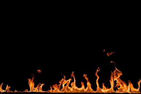 Fire flames on black background. Stock Photos