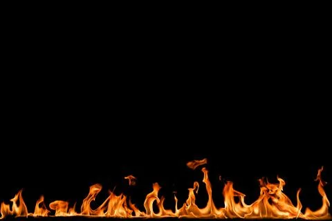 Fire flames on black background. Stock Photos