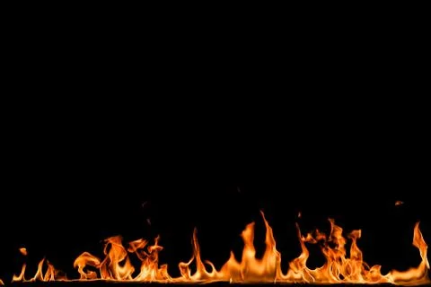 Fire flames on black background. Stock Photos