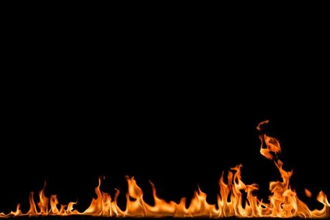 Fire flames on black background. Stock Photos