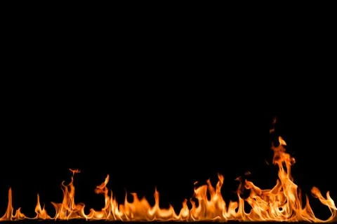 Fire flames on black background. Stock Photos