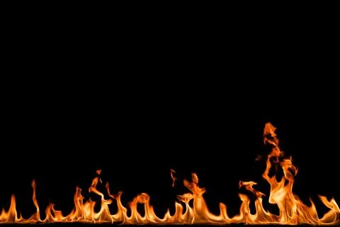 Fire flames on black background. Stock Photos