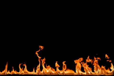 Fire flames on black background. Stock Photos