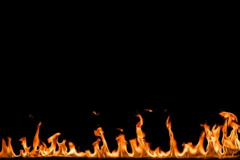 Fire flames on black background. Stock Photos