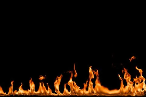 Fire flames on black background. Stock Photos