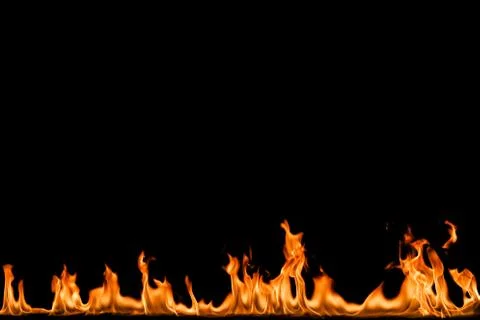 Fire flames on black background. Stock Photos