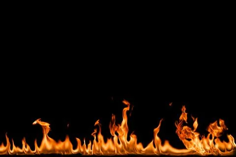 Fire flames on black background. Stock Photos