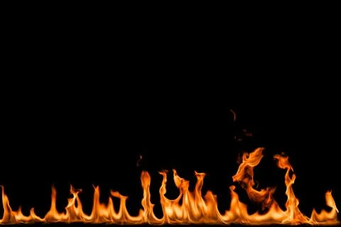 Fire flames on black background. Stock Photos