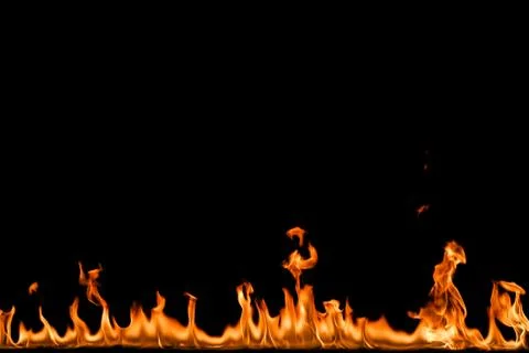 Fire flames on black background. Stock Photos
