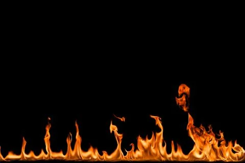 Fire flames on black background. Stock Photos
