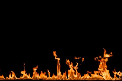 Fire flames on black background. Stock Photos
