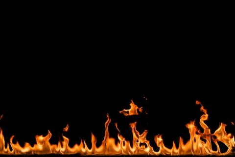 Fire flames on black background. Stock Photos