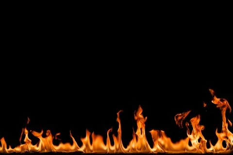 Fire flames on black background. Stock Photos