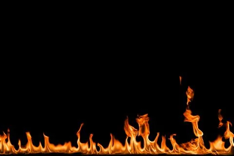 Fire flames on black background. Stock Photos