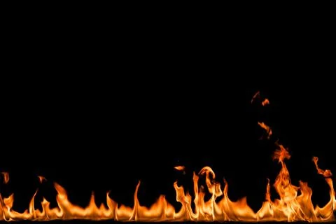 Fire flames on black background. Stock Photos