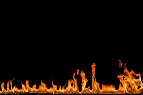 Fire flames on black background. Stock Photos