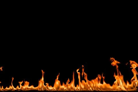Fire flames on black background. Stock Photos