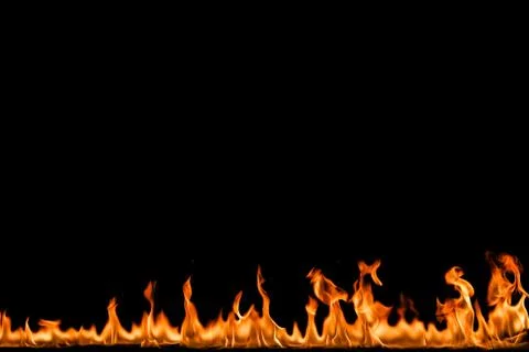 Fire flames on black background. Stock Photos
