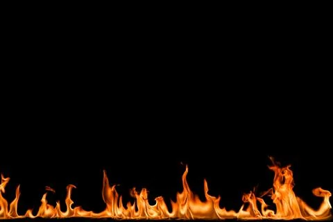 Fire flames on black background. Stock Photos