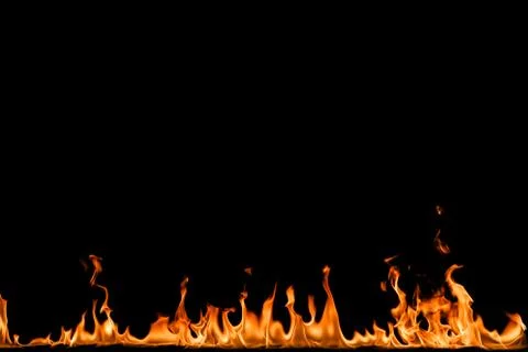 Fire flames on black background. Stock Photos