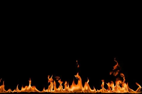 Fire flames on black background. Stock Photos
