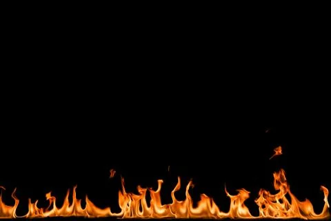 Fire flames on black background. Stock Photos