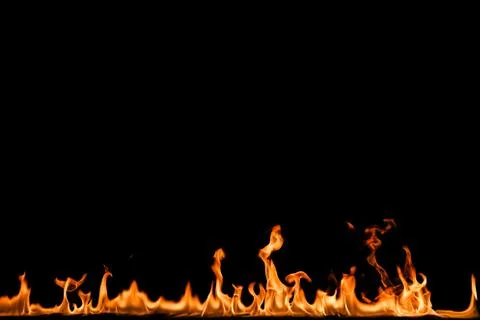 Fire flames on black background. Stock Photos