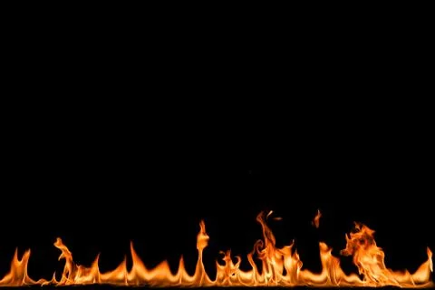 Fire flames on black background. Stock Photos