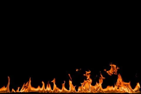 Fire flames on black background. Stock Photos