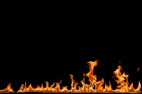 Fire flames on black background. Stock Photos