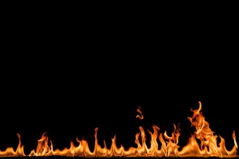 Fire flames on black background. Stock Photos
