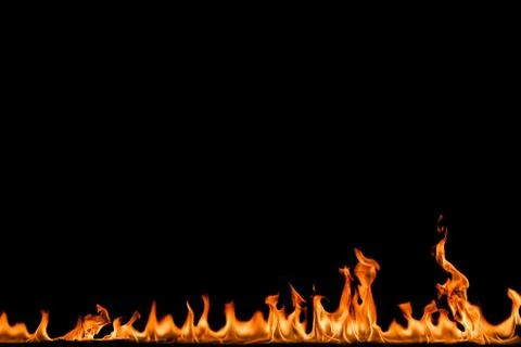 Fire flames on black background. Stock Photos