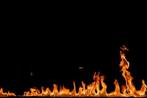 Fire flames on black background. Stock Photos
