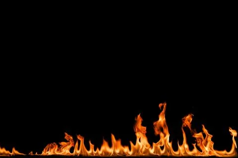 Fire flames on black background. Stock Photos
