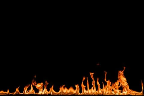 Fire flames on black background. Stock Photos