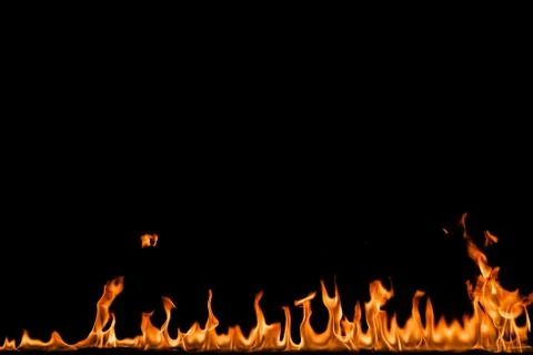 Fire flames on black background. Stock Photos